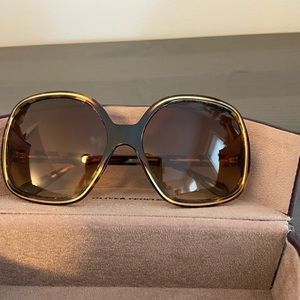 Oliver People’s oversized sunglasses